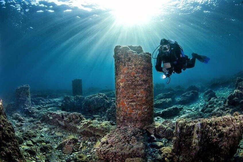 Diver among some columns at Porus Julius