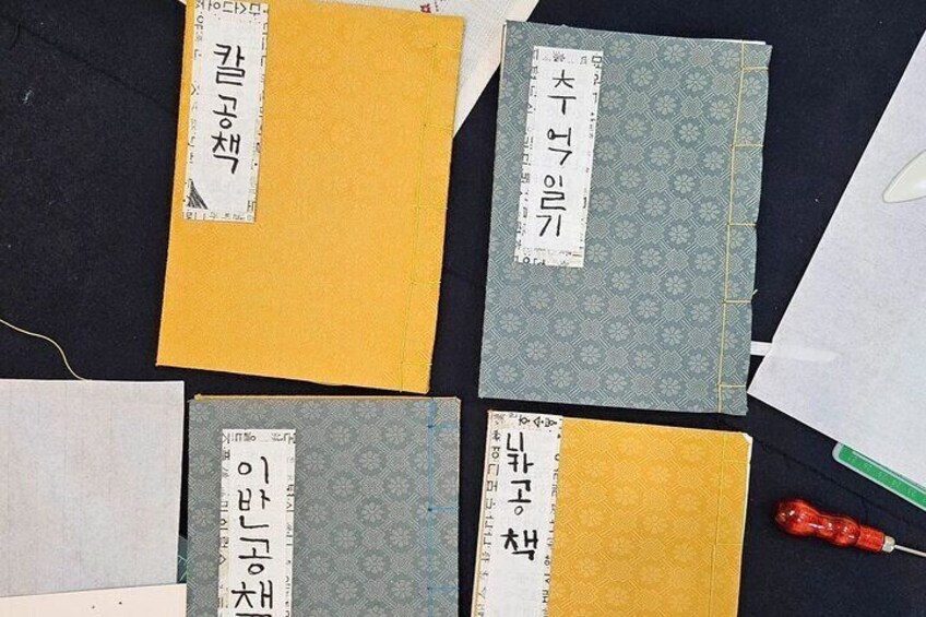 Making a traditional notebook & naming on it in Hangeul in Seoul
