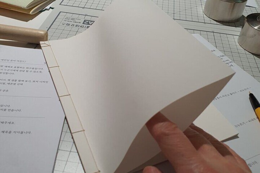 Making a traditional notebook & naming on it in Hangeul in Seoul
