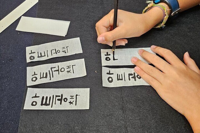 Making a traditional notebook & naming on it in Hangeul in Seoul