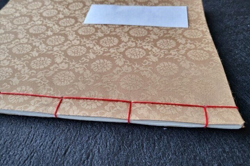 Making a traditional notebook & naming on it in Hangeul in Seoul