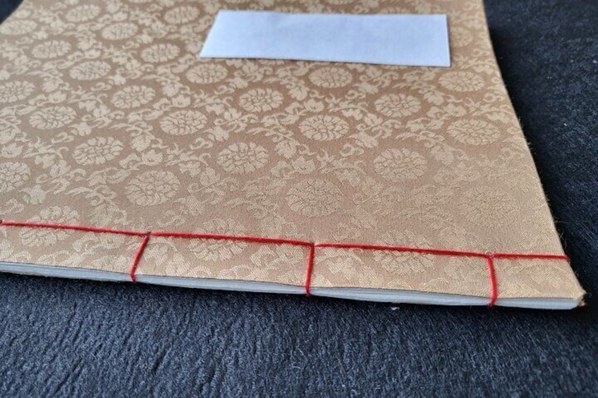 Making a traditional notebook & naming on it in Hangeul in Seoul