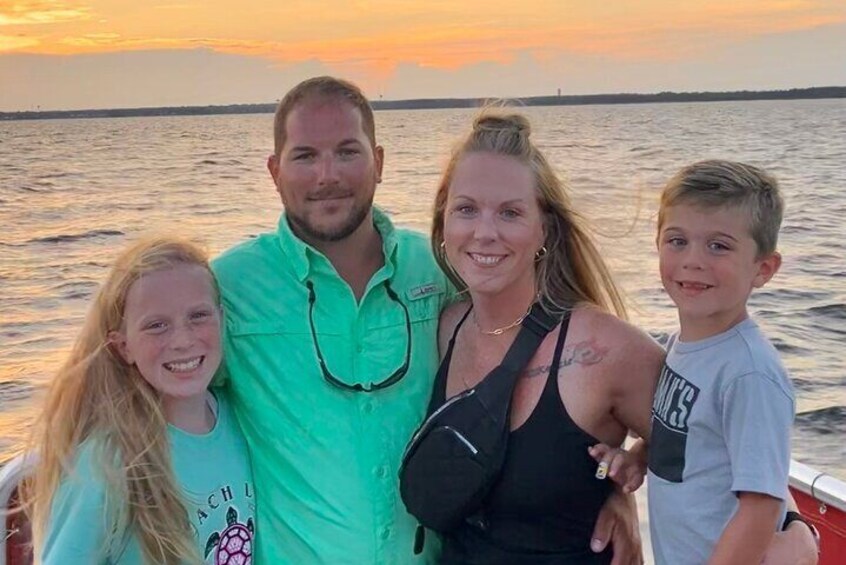 Family of cruises enjoying sunset before the Sandestin Fireworks show aboard the Sol y Luna.
