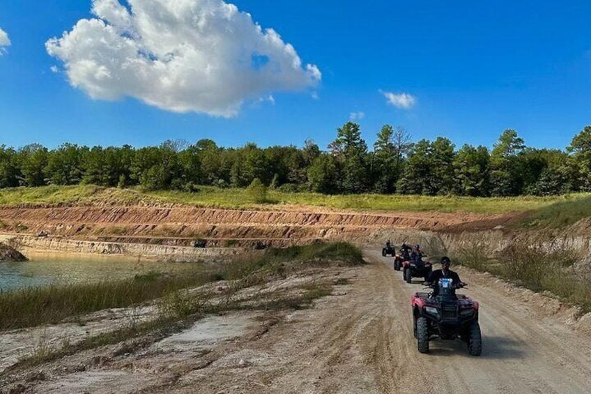 Our guided ATV tours take you through rugged trails, scenic views, and water-filled adventures!