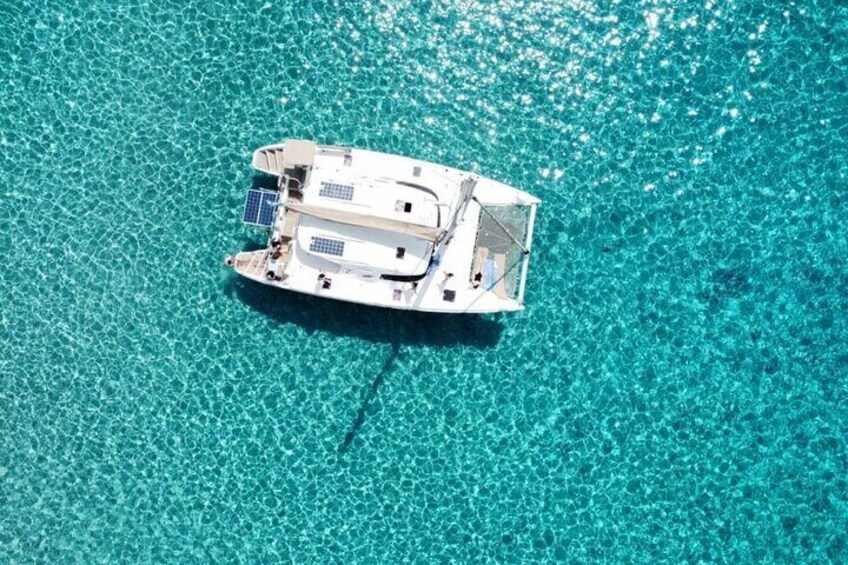 Mykonos: Private Catamaran Cruise with BBQ & Drinks
