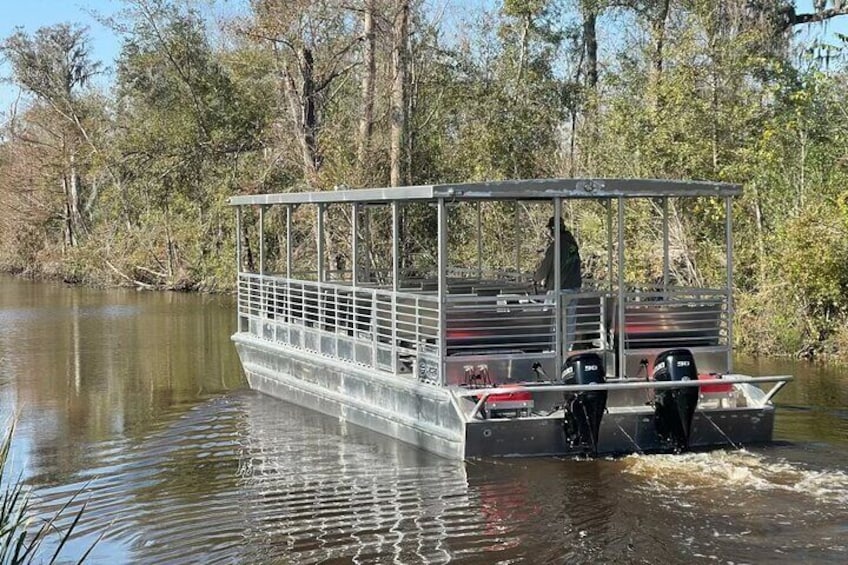 Covered Boat Swamp Tour with Transportation from New Orleans