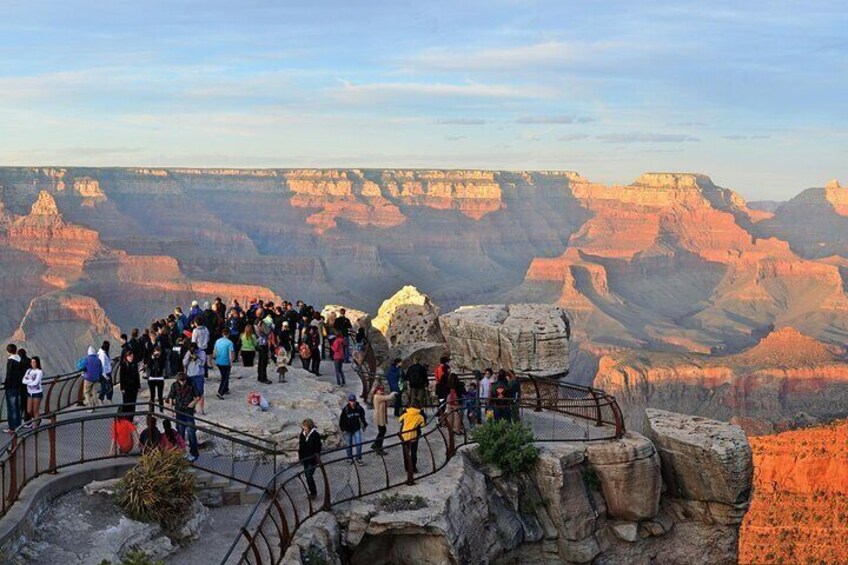 The Grand Canyon, located in Arizona, is a massive and iconic natural wonder, known for its breathtaking views, vast size, and colorful rock layers. It's a popular destination for hiking, rafting, and