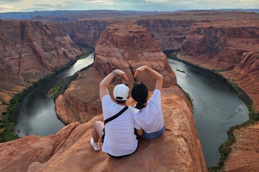 Horseshoe Bend, located near Page, Arizona, is a stunning meander of the Colorado River surrounded by red rock cliffs. Visitors can enjoy breathtaking panoramic views, making it a popular spot for pho