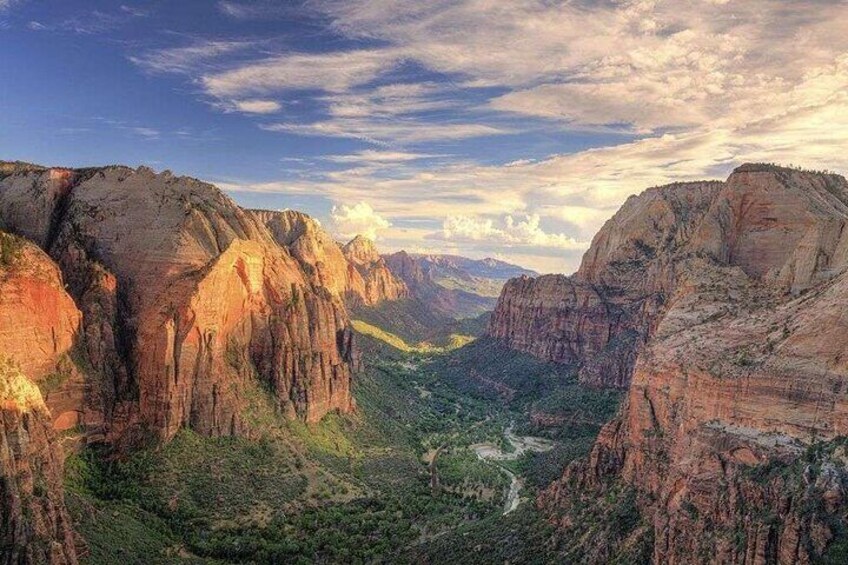 Zion Canyon, located in Zion National Park, Utah, is famous for its stunning red rock cliffs, dramatic landscapes, and scenic hiking trails like Angels Landing and The Narrows. This natural wonder off