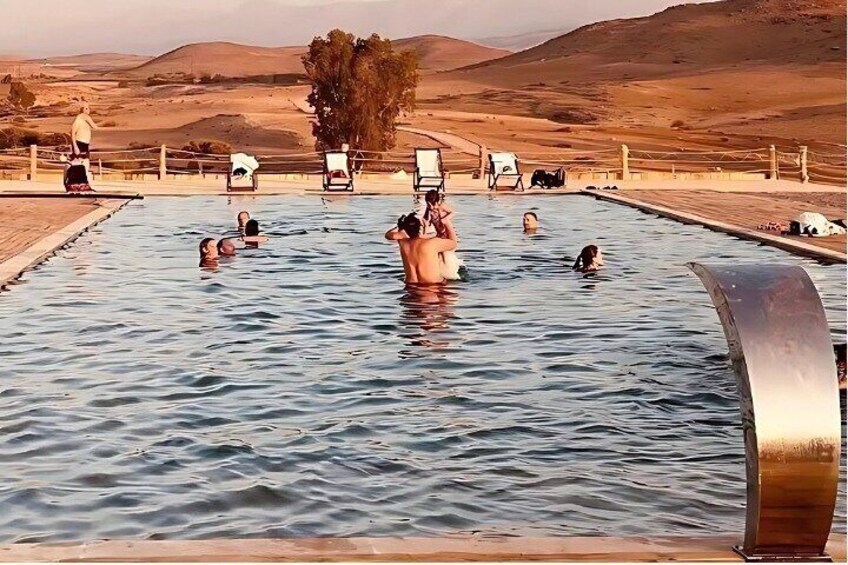 Unwind by the desert pool with stunning panoramic views of the Agafay landscape.