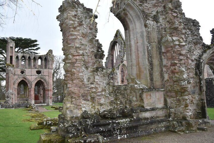 Sir Walter Scott's grave is at Dryburgh Abbey.