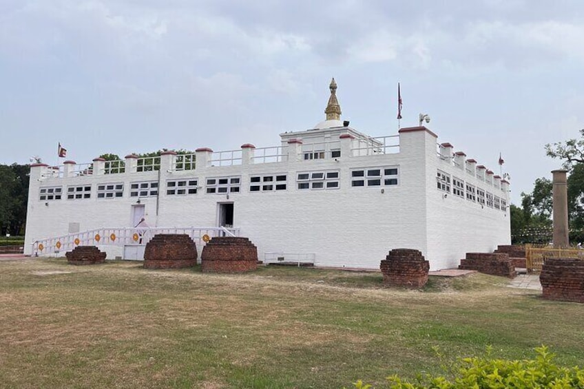 Mayawoti Temple, Birth place of Siddhartha Gautam along with Ashoka pil
ler on the right