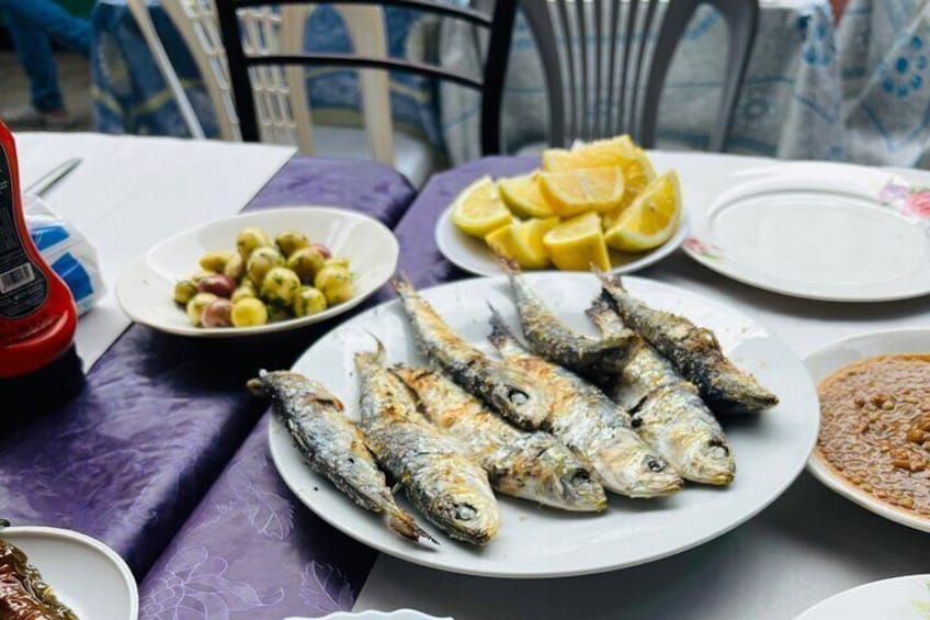 Freshly grilled sardines. 