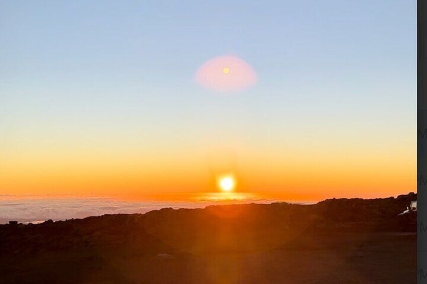 Beautiful sunset through Mauna Kea clouds