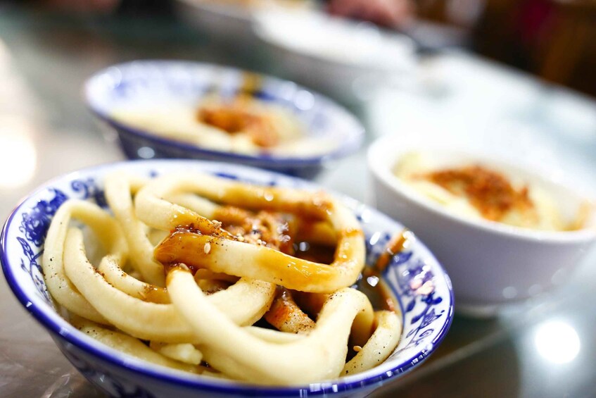 Picture 2 for Activity Chengdu: Hidden Dishes and Beers UNESCO Food Evening Tour