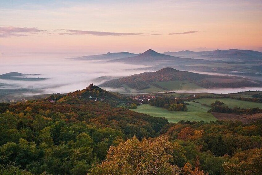 A volcanic landscape with rolling hills of the Bohemian Central Highlands, the warmest region in Bohemia, known for its winemakers and the Czech garnet