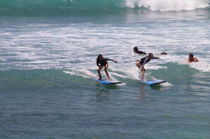 Our students on a party wave at Padang-Padang Beach