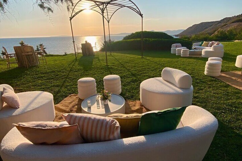 "Sip, relax, and enjoy panoramic sea views in this idyllic paradise."