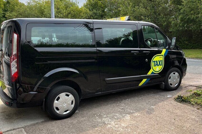 Modern 8 passenger A/C Ford Transit Custom with panoramic rear windows ideal for the touring experience.