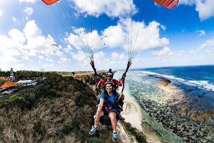 Paragliding and Rafting including lunch and pickup