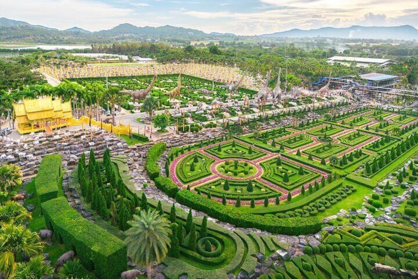 Explore the beautifully landscaped gardens at Nong Nooch Tropical Garden