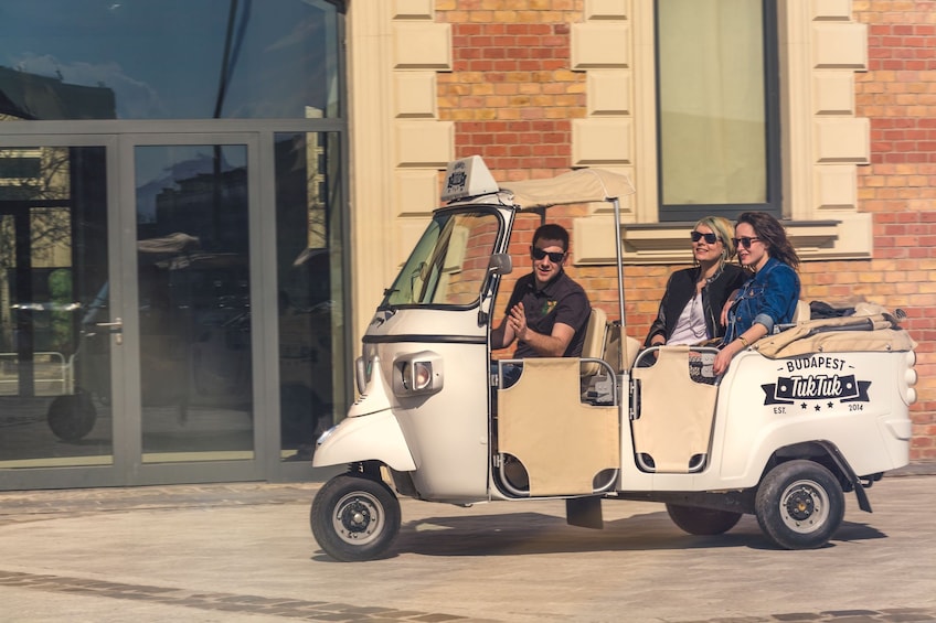 Group in a Tuk Tuk vehicle in Budapest