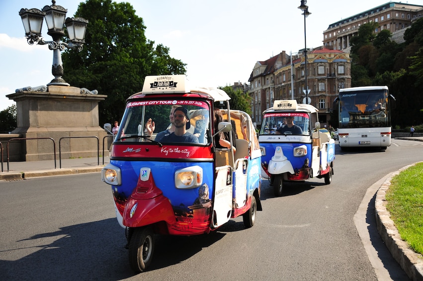 Couple of Tuk Tuks on the road in Budapest