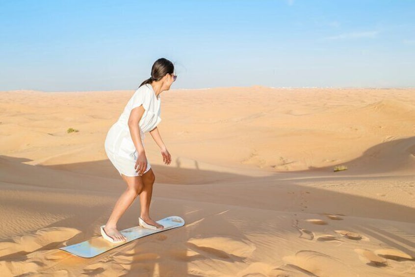 sand boarding in Dubai desert safari 