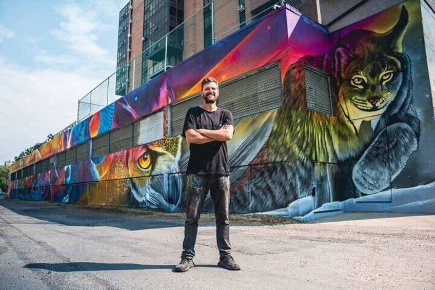 Nick Sweetman with his 2024 mural "A New Heat"