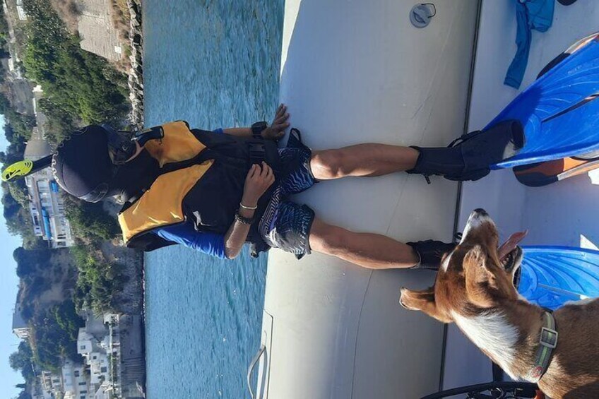 Child preparing to enter the water for snorkeling