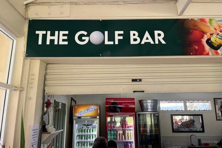 Unwind at The Golf Bar in Mele, where you can enjoy a refreshing drink while soaking in the stunning views of the lush green course.