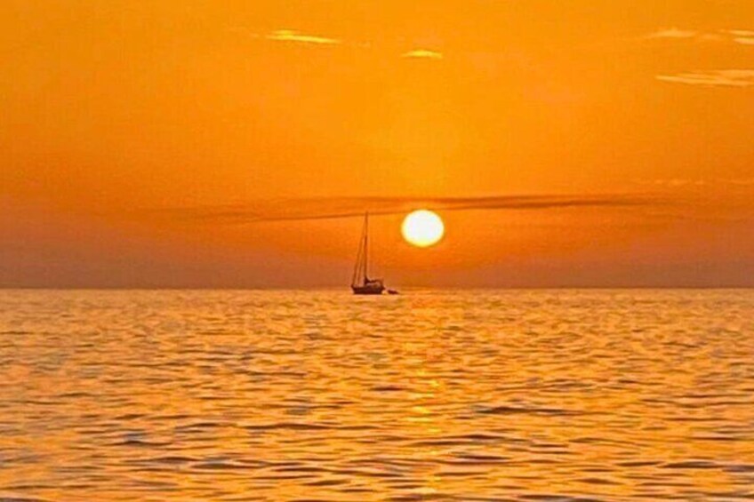 Dream sunset at sea: enjoy the magic of sunset from our private boat.