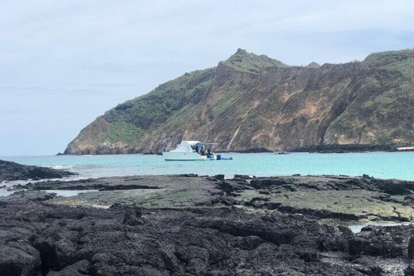 Kicker rock and a snorkeling or diving beach