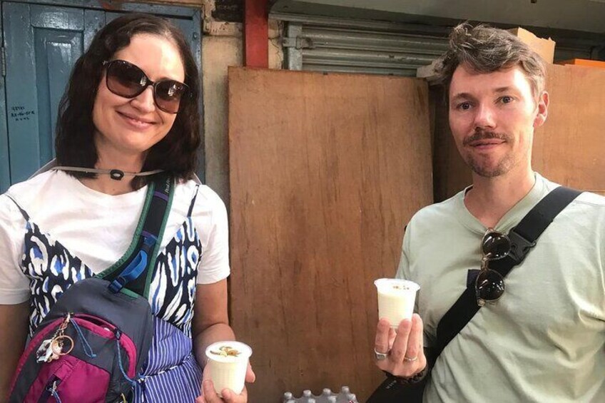 Tourists enjoying street food