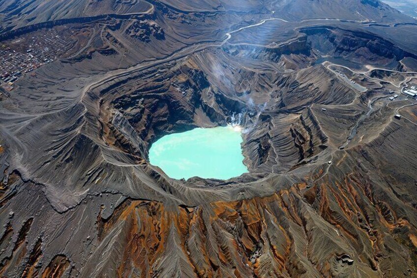 Standing on the rim of Aso's 16km-wide crater - one of Earth's last accessible supervolcanoes.