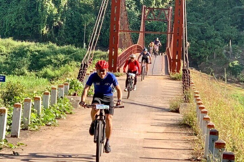 Cycling to the village in the Ba Be National Park