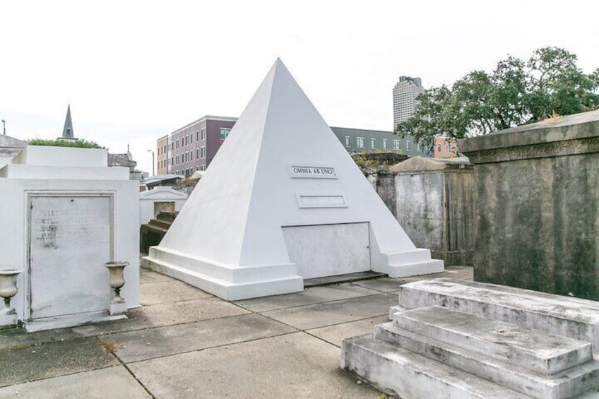 From deceased New Orleans natives to Hollywood celebrities still among the living, the graveyard also features Nicolas Cage's eccentric pyramid tomb.