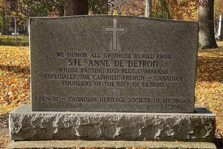 Monument at the burial site of the original settlers of Detroit.