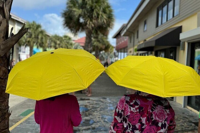 Yellow Umbrellas for everyone on the tour