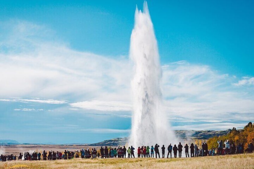 Strokkur erupting into the sky, see first hand the geothermal power of Iceland's landscape