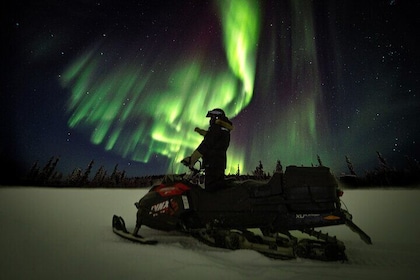 Aurora Night Snowmobile Safari Two People Share a Snowmobile