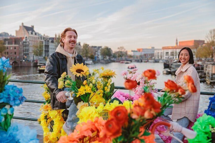 Explore Amsterdam canals on iconic Flower Bikes