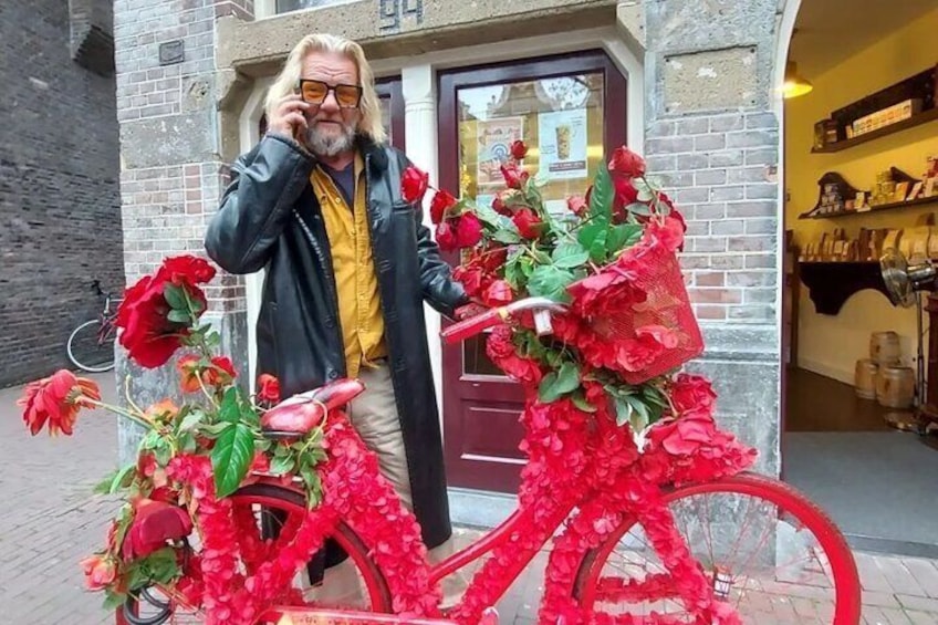 Explore Amsterdam canals on iconic Flower Bikes