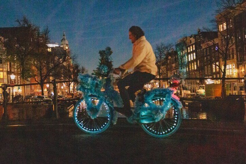 Explore Amsterdam canals on iconic Flower Bikes