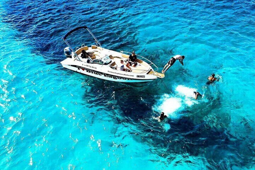 Jump off the prow with your friends into the crystal-clear waters of Blue Lagoon, making unforgettable memories on a private boat tour in Malta