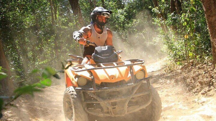 Atv tour from Cancun with ziplines and cenote swim experience