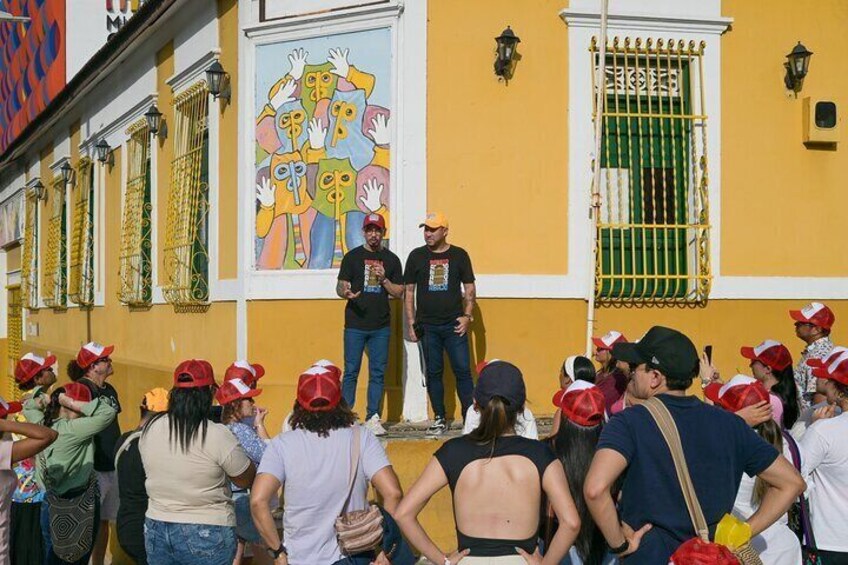 Our professional team of tour guides sharing information about the important cultural points of Barrio Abajo, Barranquilla.