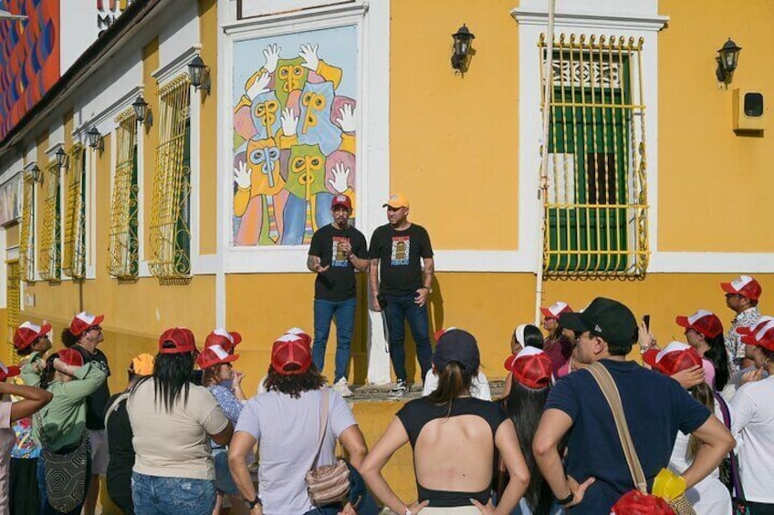 Our professional team of tour guides sharing information about the important cultural points of Barrio Abajo, Barranquilla.