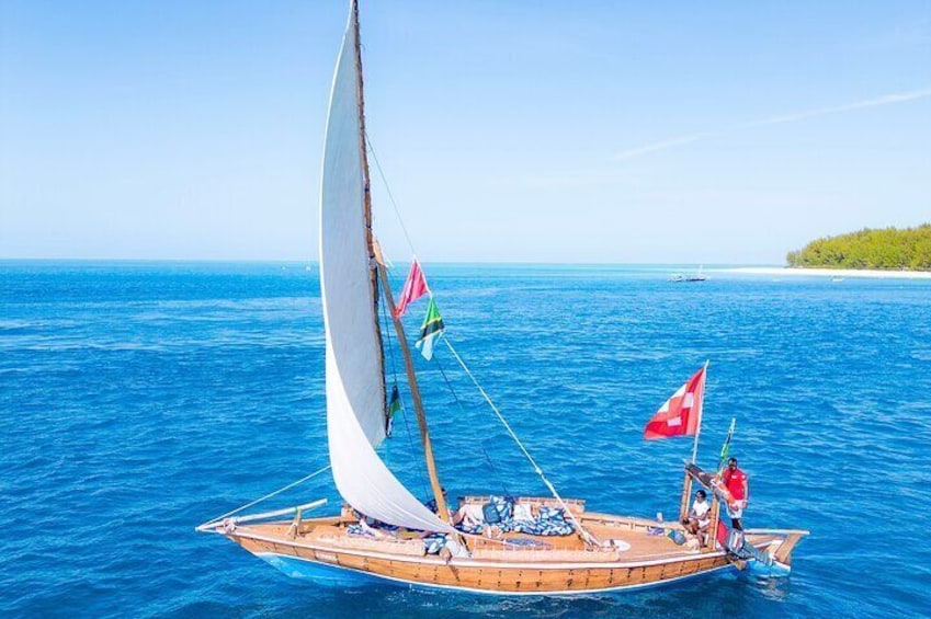 Full-day Dhow Sailing trip to Mnemba sandbank with snorkeling