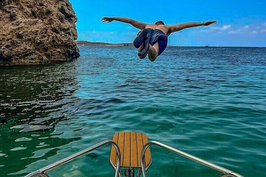 Feel the thrill of jumping off the prow of your private boat straight into the crystal-clear waters of Comino and Blue Lagoon for an unforgettable adventure.